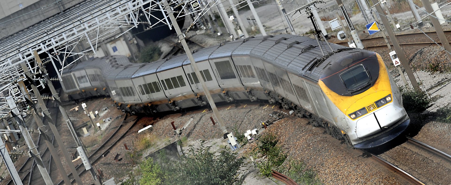 Emerging from the Channel Tunnel into the French town of Coquelles, a Eurostar train snakes its way towards Paris - resuming services after the 1000C inferno in 2008 which disrupted services for months. Photo: PHILIPPE HUGUEN/ AFP via Getty Images