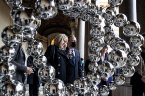 Brigitte Macron and Kamala Harris’ husband Doug Emhoff at an exhibition by French artist Jean-Michel Othoniel.