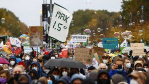 Environmental activists gather around Brandenburg Gate during another climate demonstration. Photo:  Abdulhamid Hosbas/Anadolu Agency via Getty Images