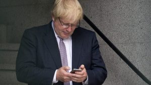 Boris Johnson with a 
troublesome five letter word. Photo: Justin Tallis/AFP/Getty