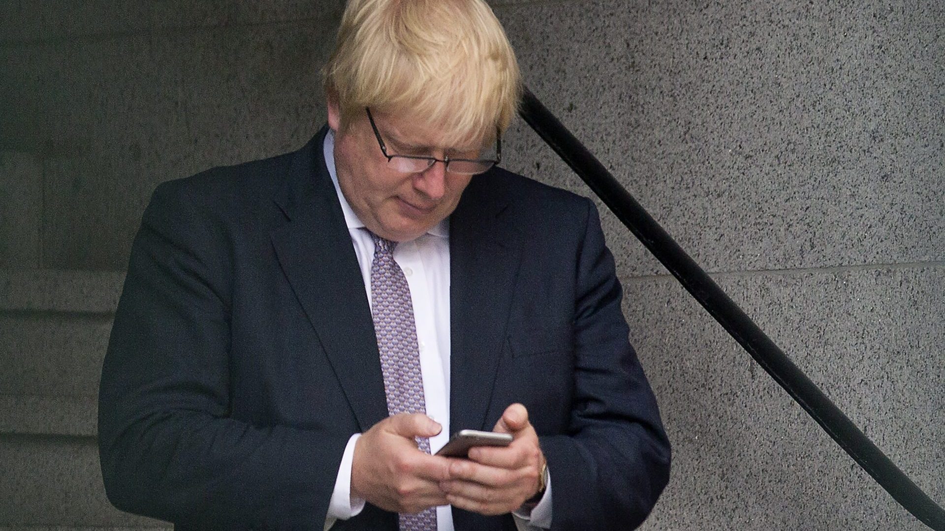 Boris Johnson with a 
troublesome five letter word. Photo: Justin Tallis/AFP/Getty