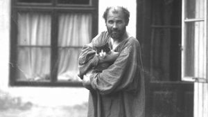 Gustav Klimt and cat outside his studio in Vienna, 1912. Photo: Imagno/Getty