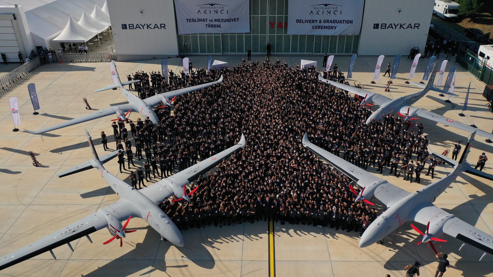 A crowd, including president Recep Tayyip Erdogan at a launch ceremony for the country’s Bayraktar drones, August 2021 Below, Erdoğan makes a speech in Ankara on March 3 as he tries to maintain relationships with both Russia and Ukraine. Photo: Anadolu/Getty Images; Murat Kurat/Getty Images