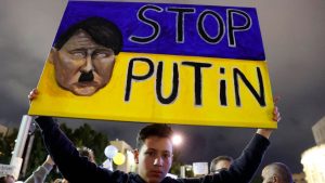 A demonstrator in front of the Russian embassy in the Israeli coastal city of Tel Aviv. Photo: JACK GUEZ/AFP via Getty Images