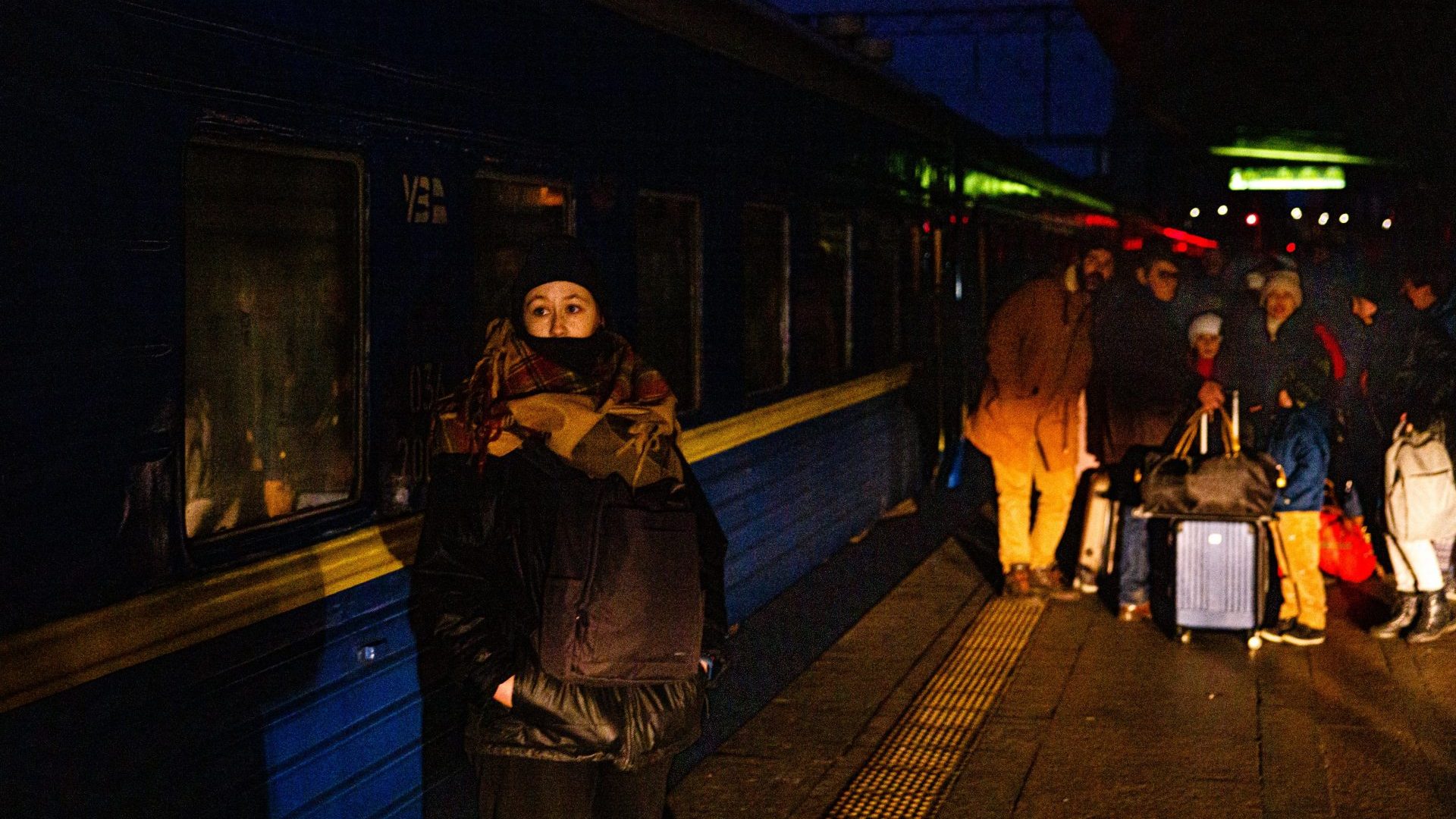 A woman waits to board an evacuation train at Kyiv central train station. Photo:DIMITAR DILKOFF/AFP via Getty Images