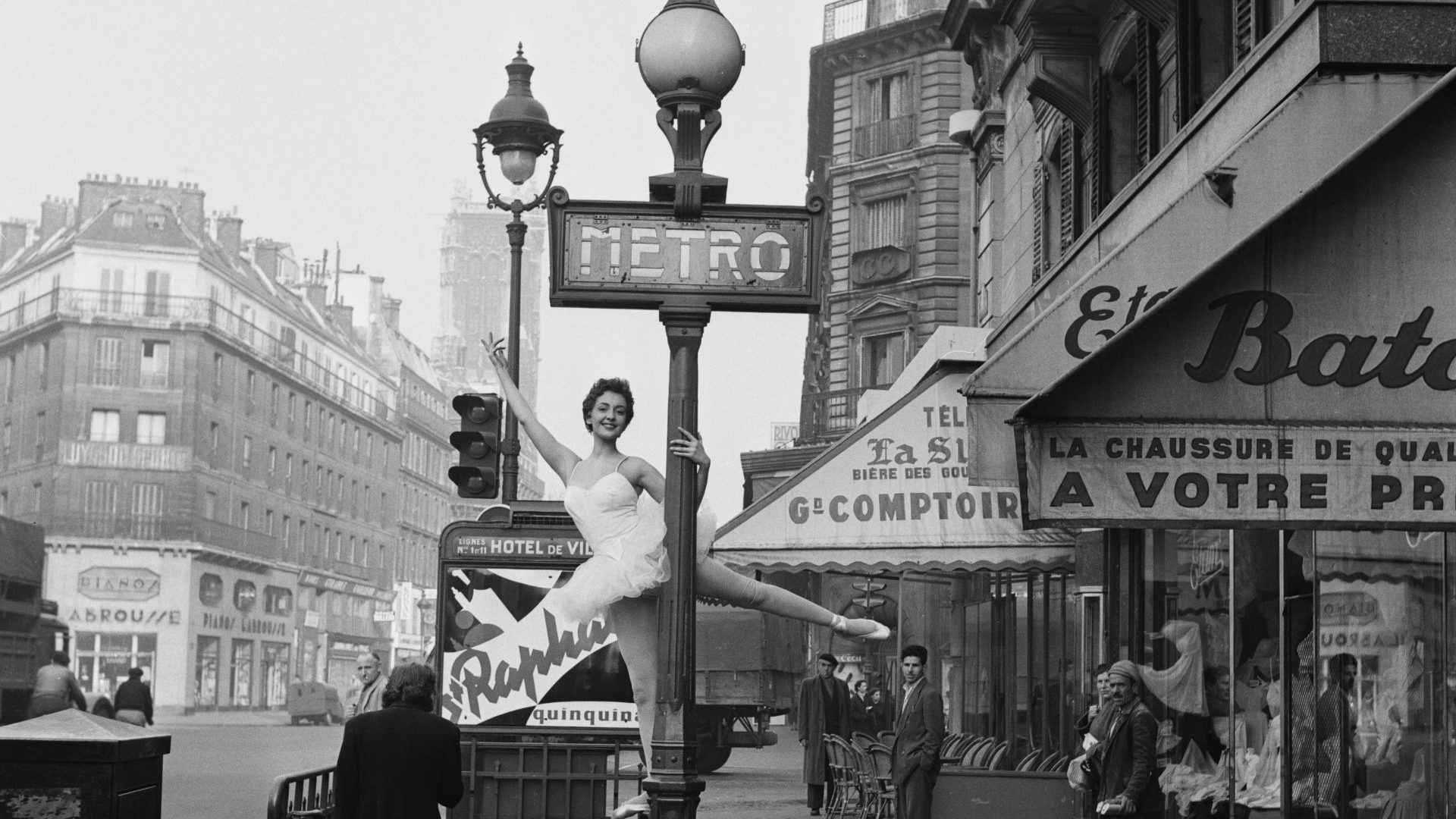 Christianne Gaulthier, a dancer at the Moulin Rouge, poses outside the Hotel de Ville Métro station in 1955. Photo: Serge Berton/BIPs/Hulton Archive/Getty