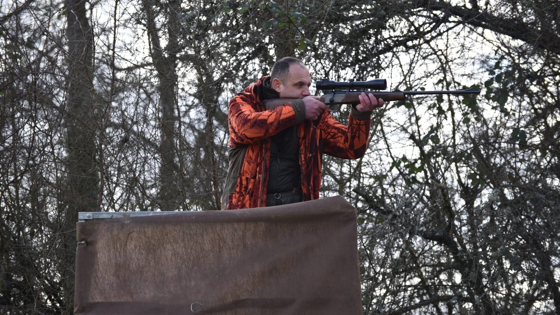France hunter posing with his gun.
