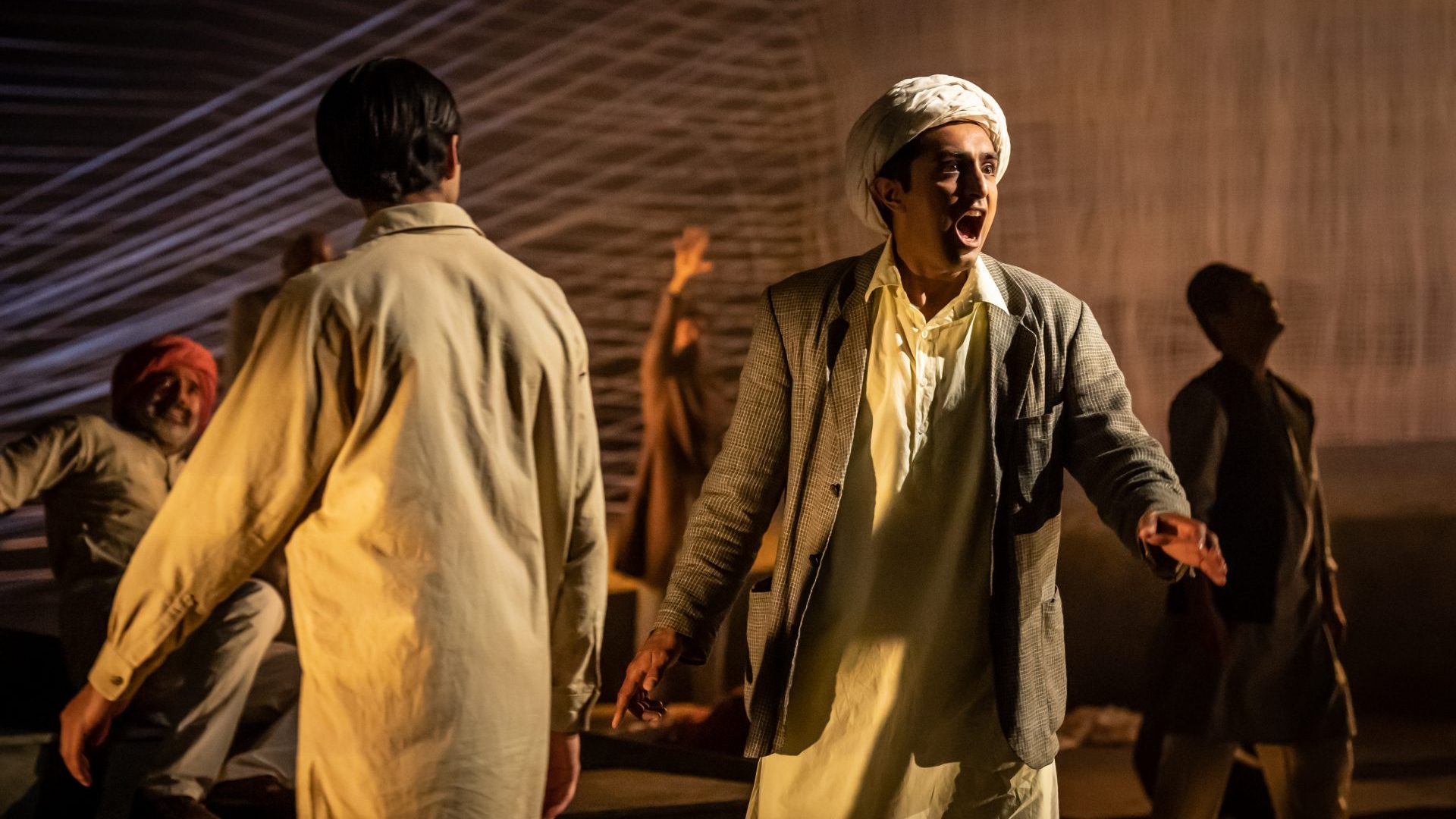 Akshay Shah and company in The Father and the Assassin at the National Theatre (Photo: Marc Brenner)