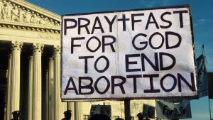 Anti-abortion demonstrators 
outside the Supreme Court building, 1991. Photo: Andrew Holbrooke/
Corbis/Getty Images