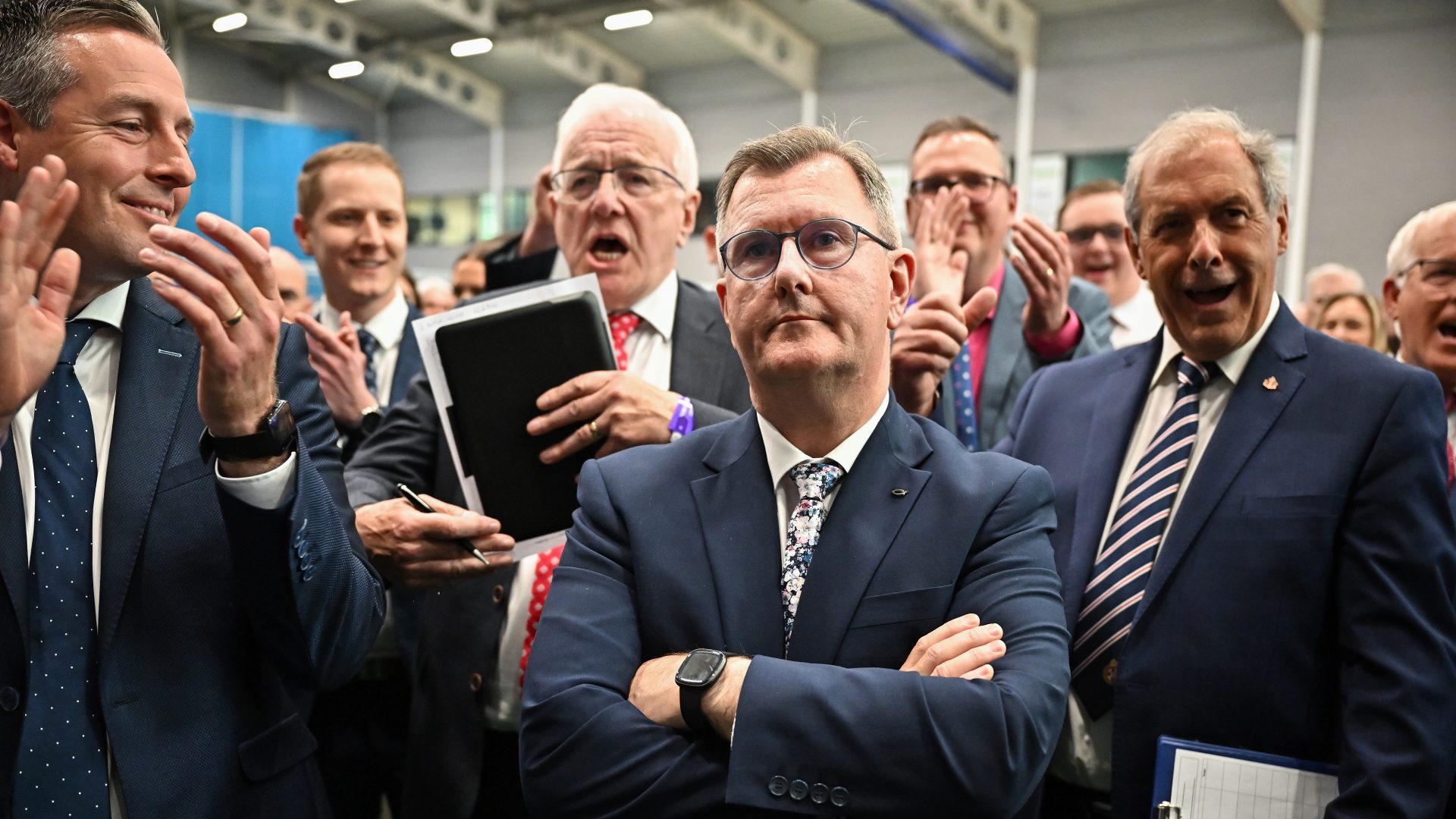 Supporters cheer his result but leader Sir Jeffrey Donaldson can’t hide his 
disappointment on a bad election night for his DUP. Photo: Jeff J Mitchell/Getty Images