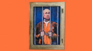 A new work in Barcelona by the Italian street artist Tvboy depicts Putin in prison. Photo: Josep Lago/Getty/TNE