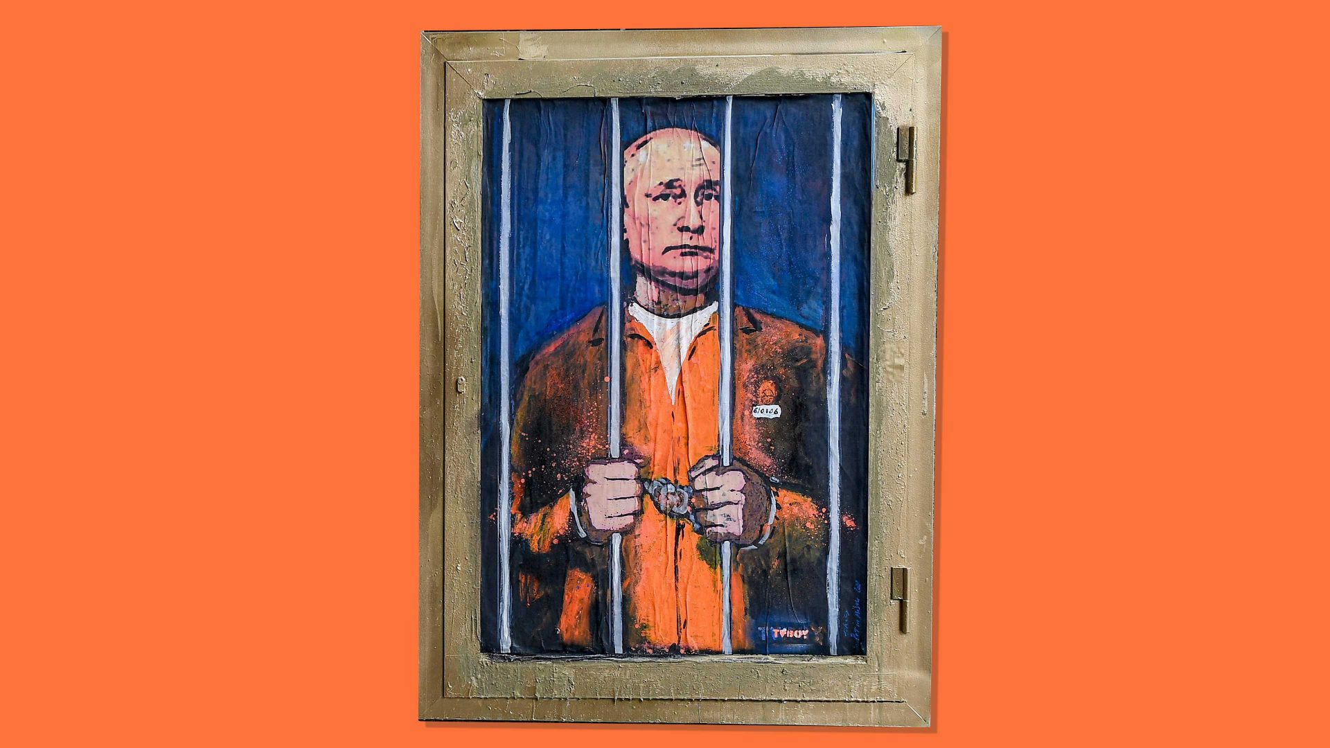 A new work in Barcelona by the Italian street artist Tvboy depicts Putin in prison. Photo: Josep Lago/Getty/TNE
