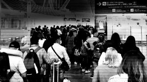 British holidaymakers queue at Madrid airport this Easter