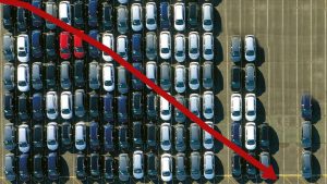 UK car manufacturing is in crisis. Photo montage: TNE