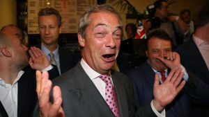 Nigel Farage and Arron Banks (right) celebrate at a Leave.EU referendum party 
on June 24 2016. Photo: Geoff Caddick/AFP