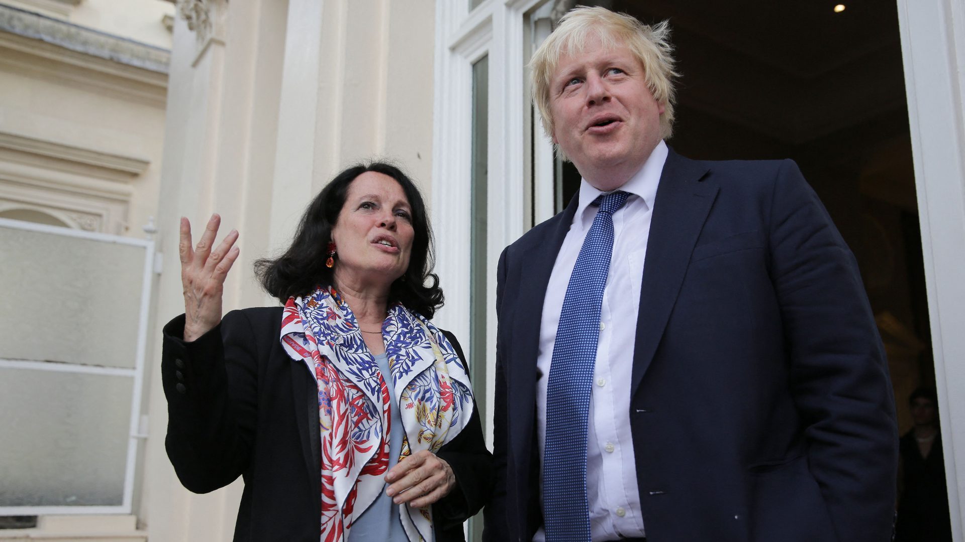 Then foreign secretary Boris Johnson talks with France's then ambassador to Britain, Sylvie Bermann, at a reception in 2016 (Photo by DANIEL LEAL/AFP via Getty Images)