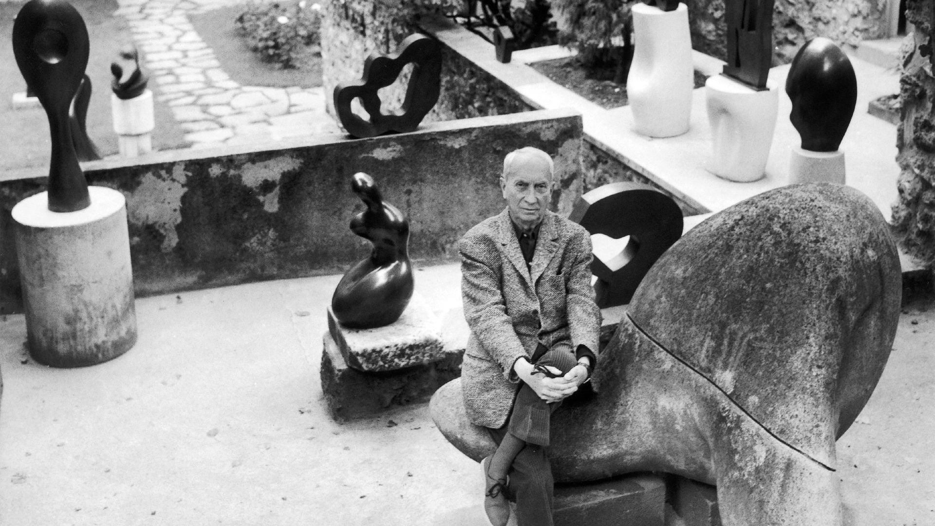 Jean Arp with some of his sculptures, circa 1960, in Clamart, France
(Photo: Keystone-France/Gamma-Rapho/Getty)