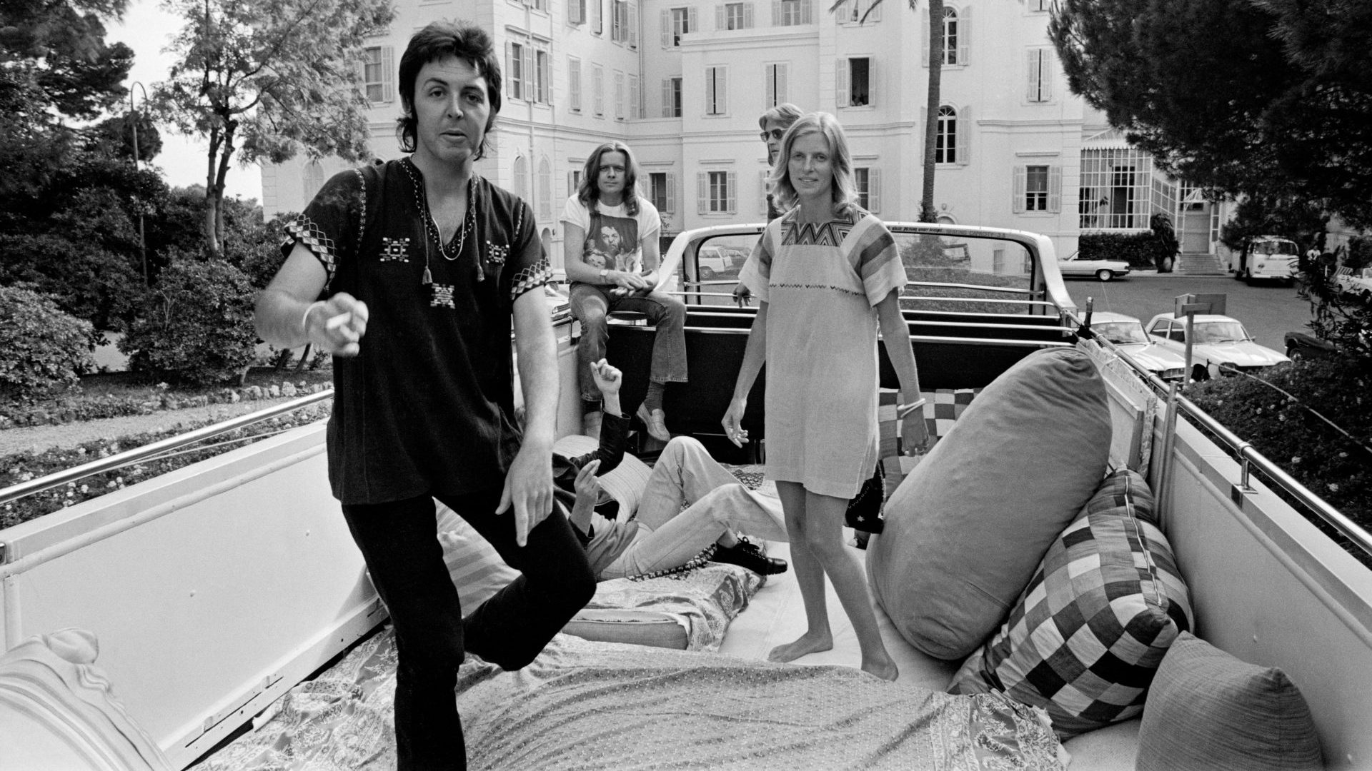 Paul and Linda on the top deck of the bus with Henry McCullough 
in Juan-les-Pins, July 12 (Photo: Reg 
Lancaster/Daily Express/Hulton/Getty)
