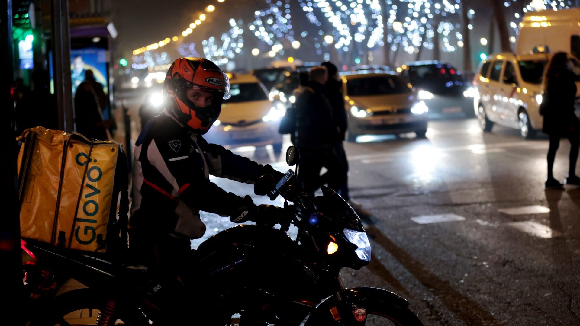 A view from Madrid streets as home delivery workers in the city work day and night (Photo by Juan Carlos Rojas Rodriguez/Anadolu Agency via Getty Images)