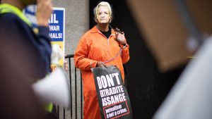 A supporter of Wikileaks founder Julian Assange 
outside the Old Bailey in 2020. Photo: Leon Neal/Getty 