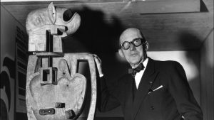 Le Corbusier with one of his sculptures at the Musee d’Art 
Moderne in Paris, November 17, 1953. Photo: STF/AFP/Getty