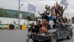 Taliban fighters in Kabul mark the first anniversary of their return to power in 
Afghanistan, August 15, 2022. Photo: Wakil Kohsar/AFP/
Getty