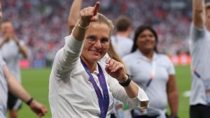 Sarina Wiegman, head coach of England, salutes the fans following the UEFA Women's Euro England 2022 final (Photo by Jonathan Moscrop/Getty Images)