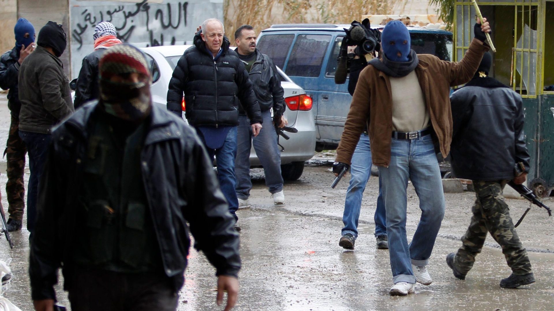 Jeremy Bowen with rebels from the Free Syria Army in Saqba. Picture courtesy of the author