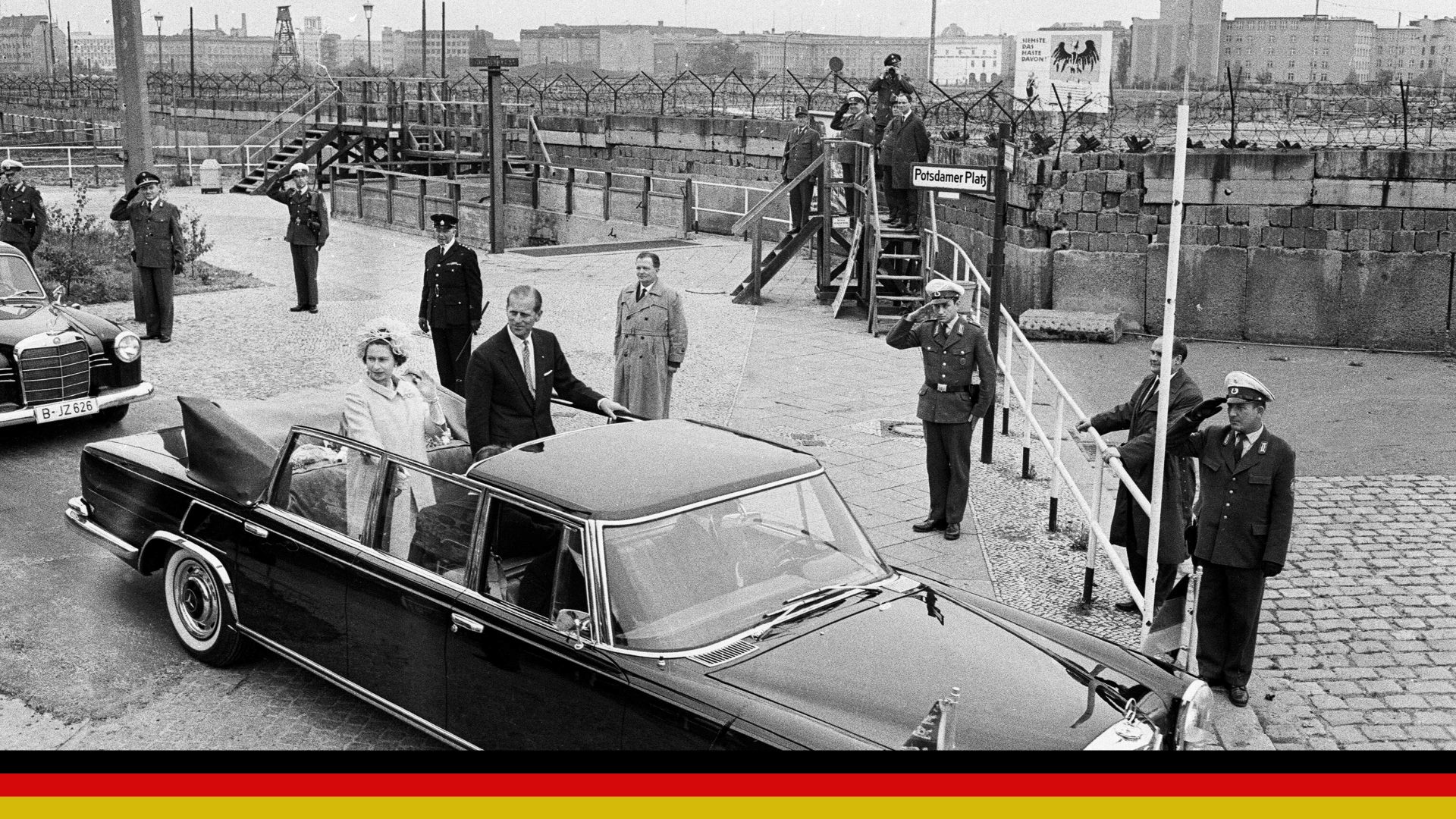 The Queen and Prince Philip at the Berlin Wall during their visit to West Germany, May 1965. Photo: Ron Burton/Mirrorpix