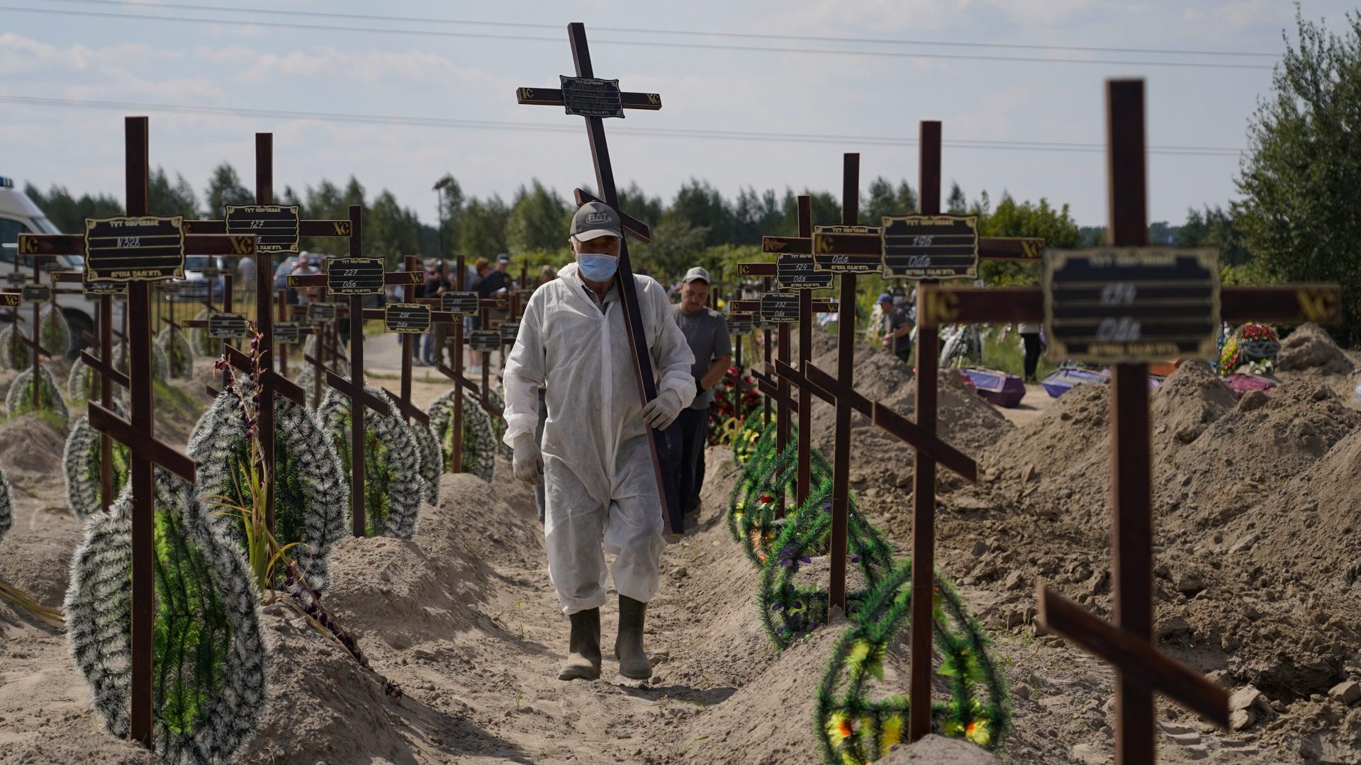 Burial ceremony for the remains of unidentified people who were killed in the Bucha district during the Russian occupation. Photo: Oleg Pereverzev/NurPhoto via Getty Images