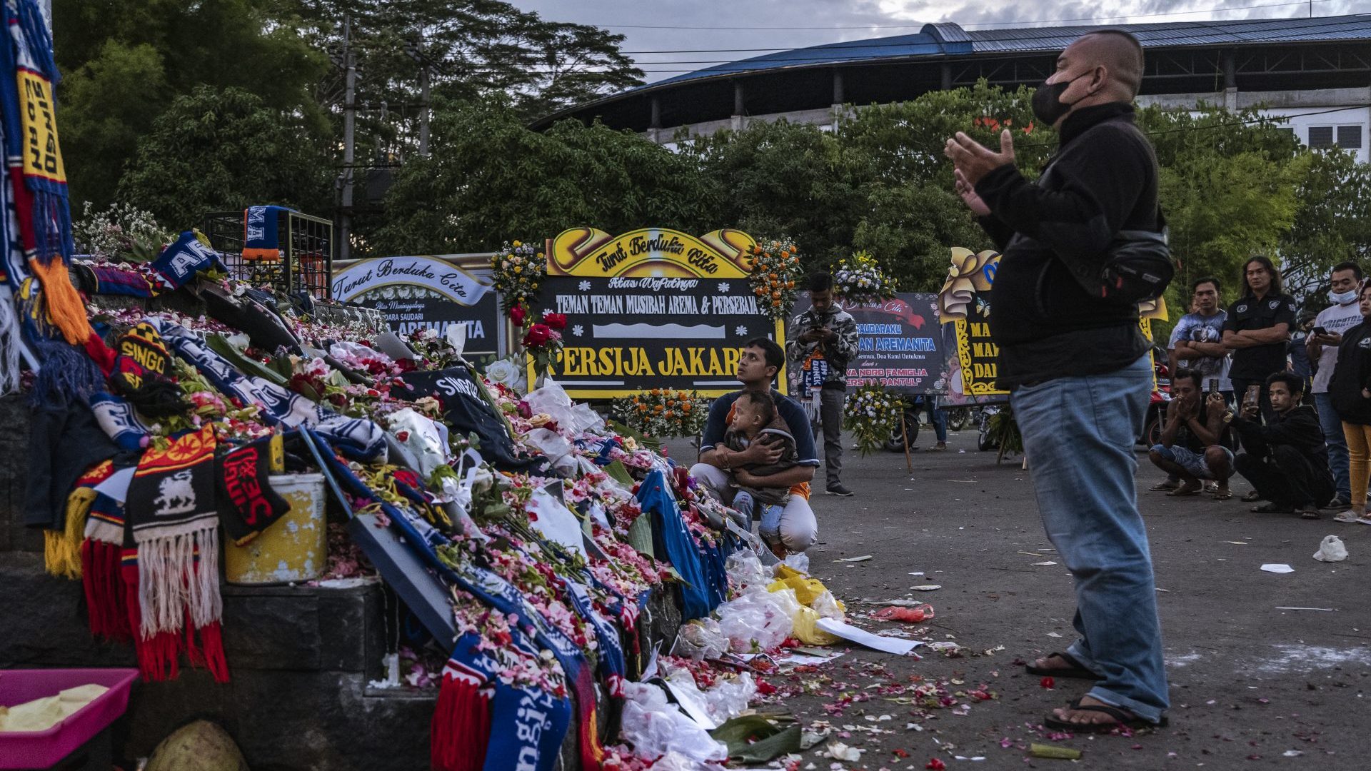 Mourners pay tribute to the victims of last weekend’s Kanjuruhan Stadium disaster in Malang, Indonesia. Photo: Ulet Ifansasti/Getty