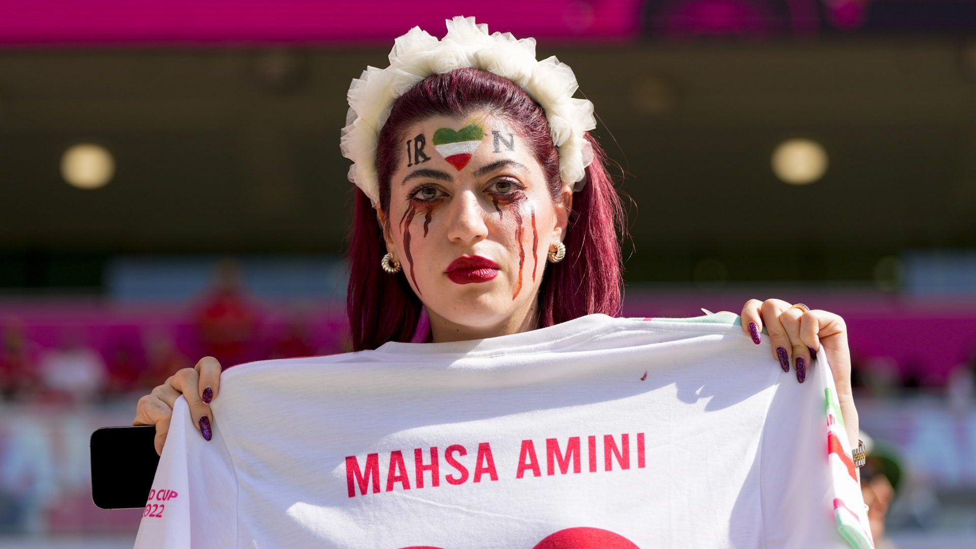 Fans of Iran protest with flags and banners with the slogan Woman Life Freedom prior to the World Cup Qatar match between Wales and Iran (Photo by Ulrik Pedersen/DeFodi Images via Getty Images)