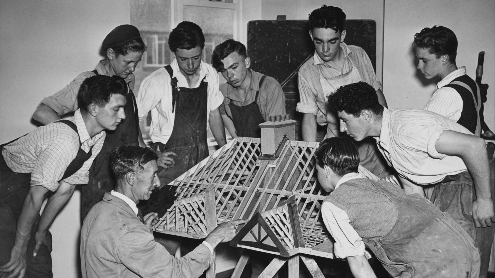 An instructor leads a construction lesson in Hanwell, west London, circa 1955. Today’s construction industry is suffering a severe shortage of workers and skills. Photo: Fred Morley/Fox