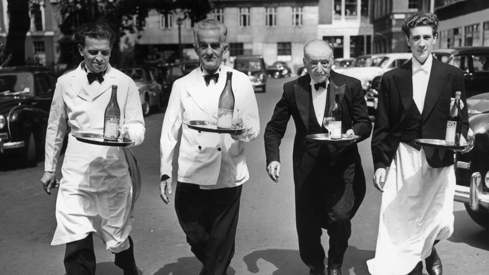 London waiters in 1955 train for their annual race. Left to right: Fermo Isotta, Ugo Taddei, Salvatore Criscuolo (75 years old), and Tony Ford. Photo: Reg Speller/Fox Photos/ Getty