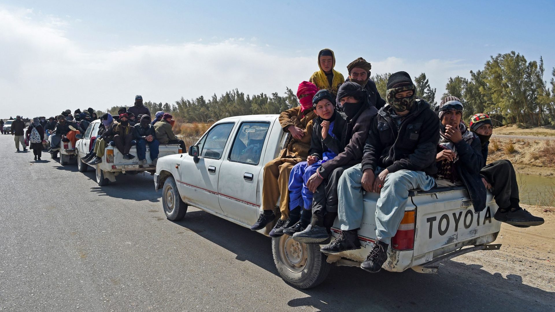 Would-be migrants head towards the Afghanistan-Iran border in Nimroz in February. Up to 5,000 people a day are flowing into Iran. Photo: Wakil Kohsar/AFP/Getty