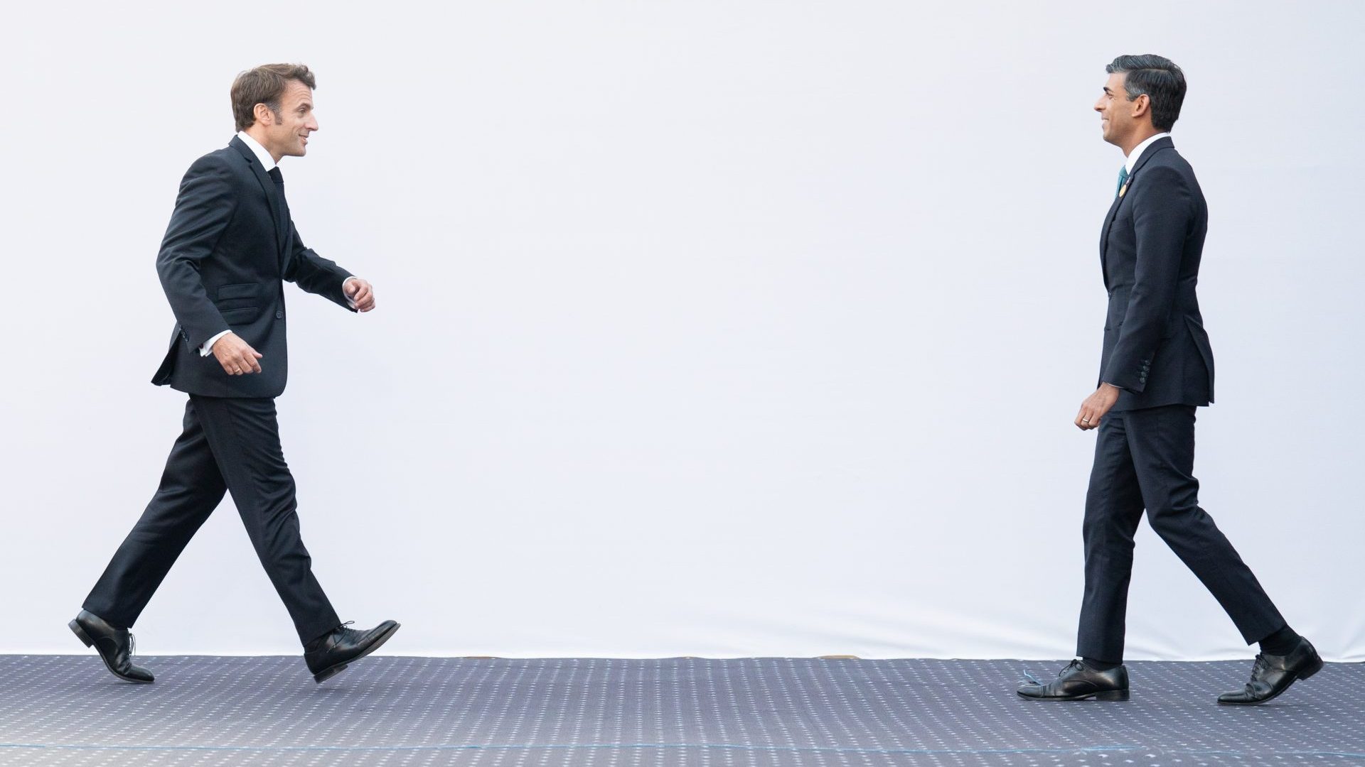 Emmanuel Macron (L) and Rishi Sunak ahead of a bilateral meeting during the COP 27 climate conference (Photo by Stefan Rousseau - Pool/Getty Images)