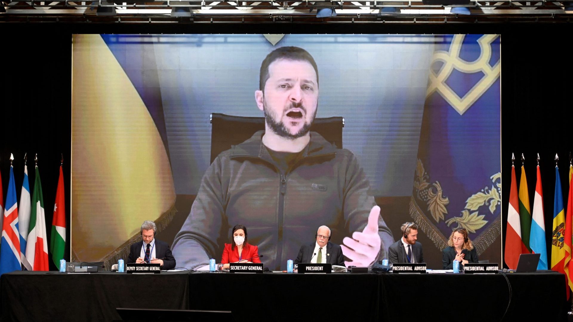Volodymyr Zelensky appears on a giant 
screen to deliver a speech during Nato’s 
parliamentary assembly annual session in Madrid, November 2022. Photo: Oscar del Pozo/AFP/Getty
