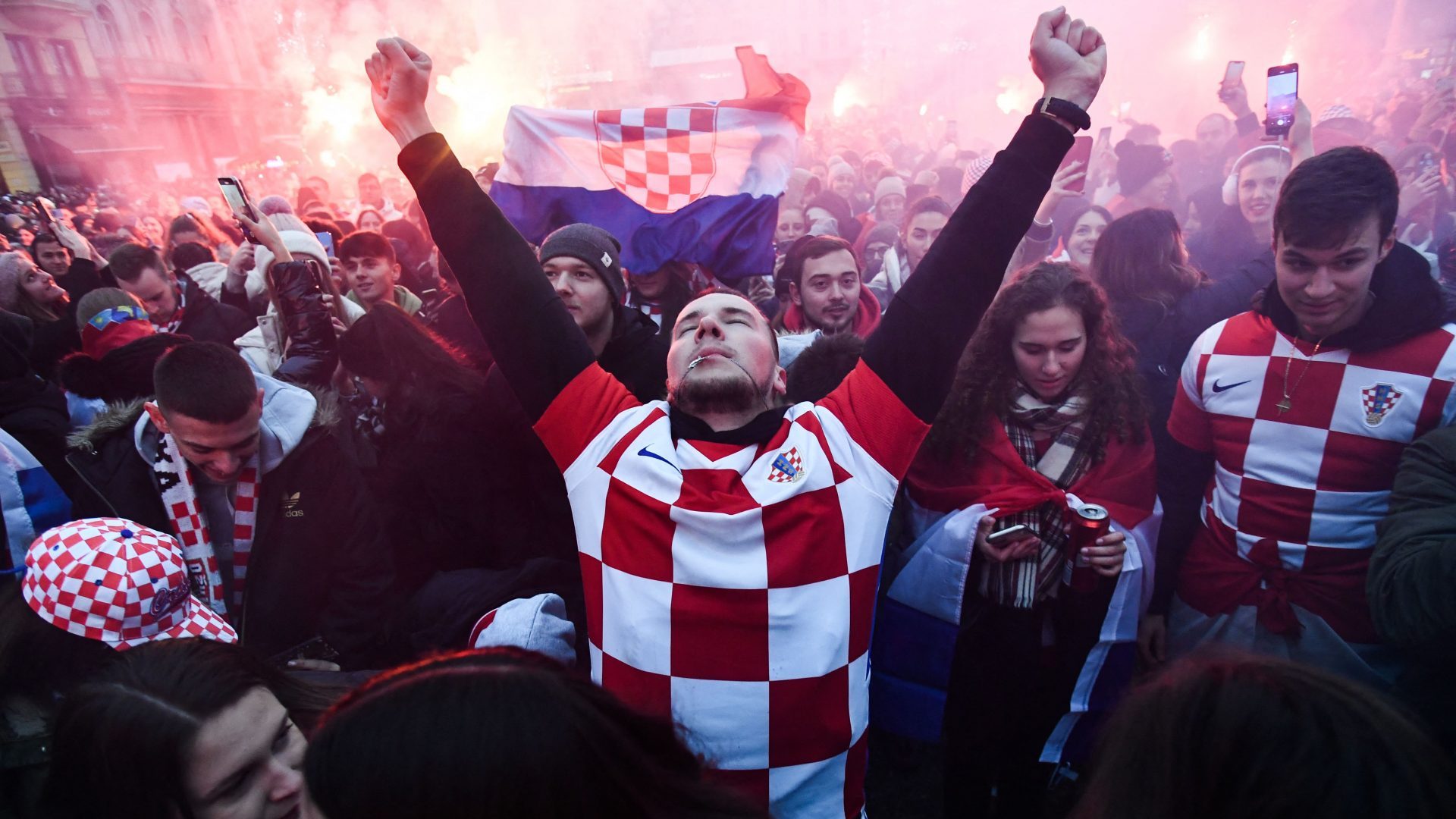 Fans celebrate as Croatia scores against Morocco in the 2022 World Cup. Photo: Denis Lovrovič/Getty