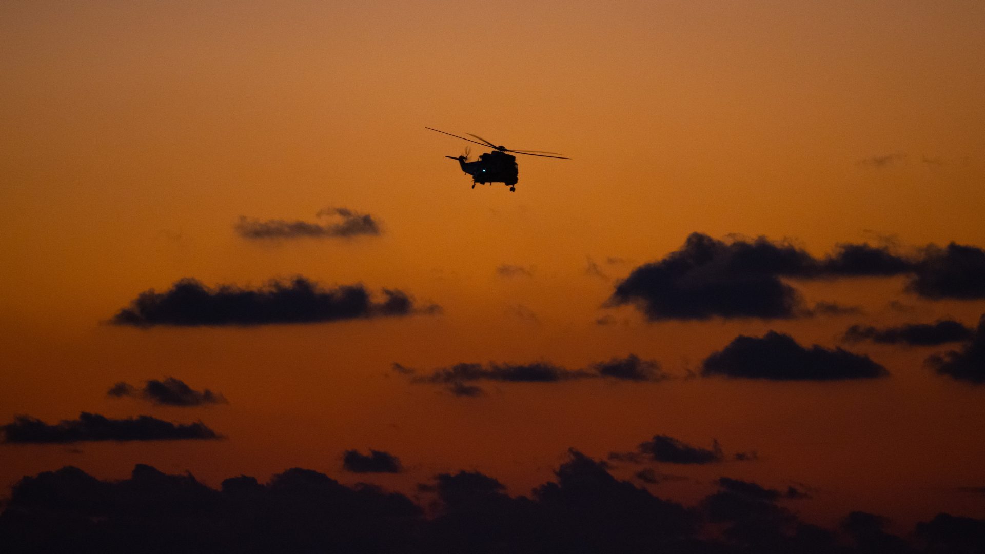 A Sea King helicopter comes in to land at the HeliOps base at Portland, Dorset. Photo: Finnbarr Webster/Getty