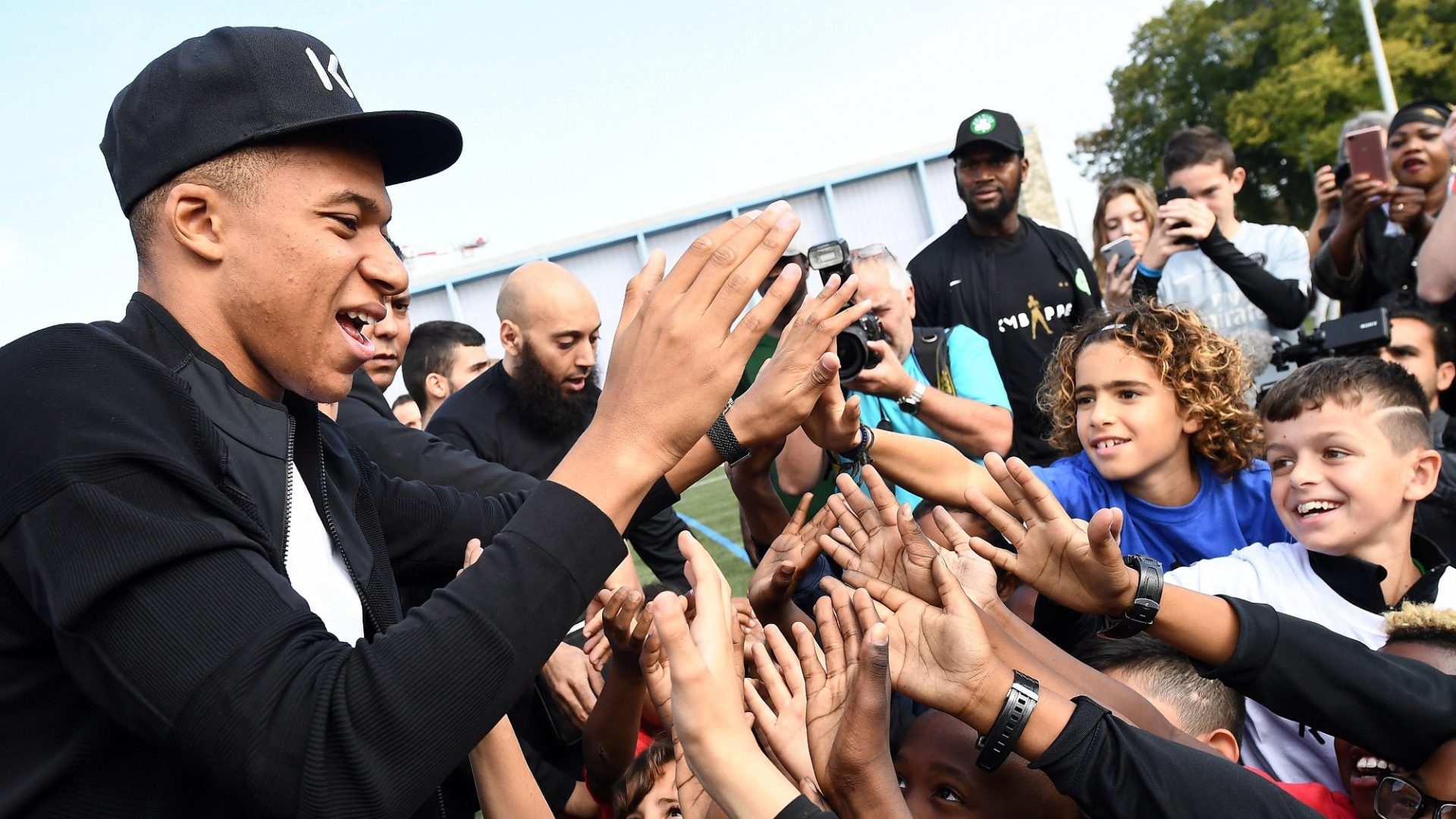 Kylian Mbappé greets fans on his return to Bondy after France’s victory in the 2018 World Cup in Russia. Photo: Franck Fife/AFP/Getty