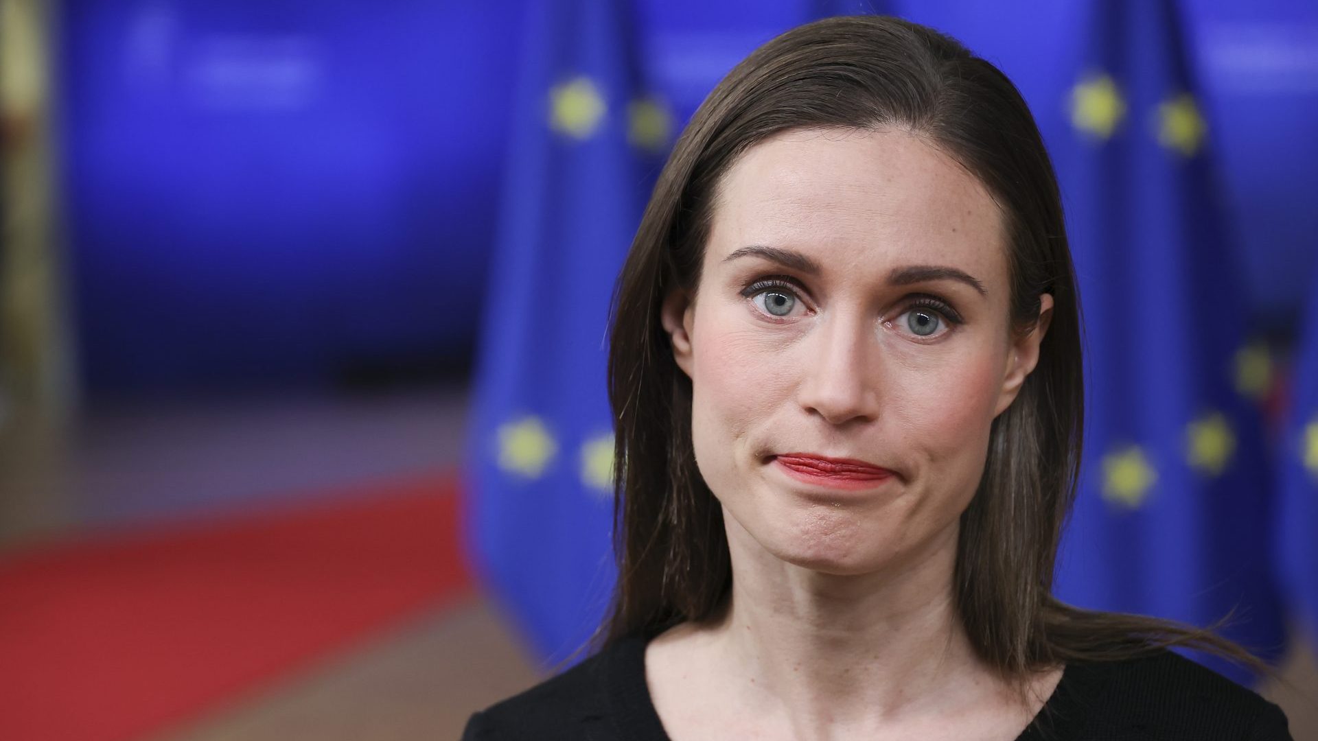 Prime Minister of Finland Sanna Marin talks to the media at a standup doorstep press briefing. Photo: Nicolas Economou/NurPhoto via Getty Images