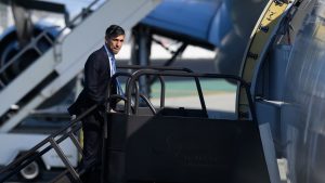 Rishi Sunak boards his plane at the end of his visit for the AUKUS summit on March 13 (Photo by Leon Neal/Getty Images)