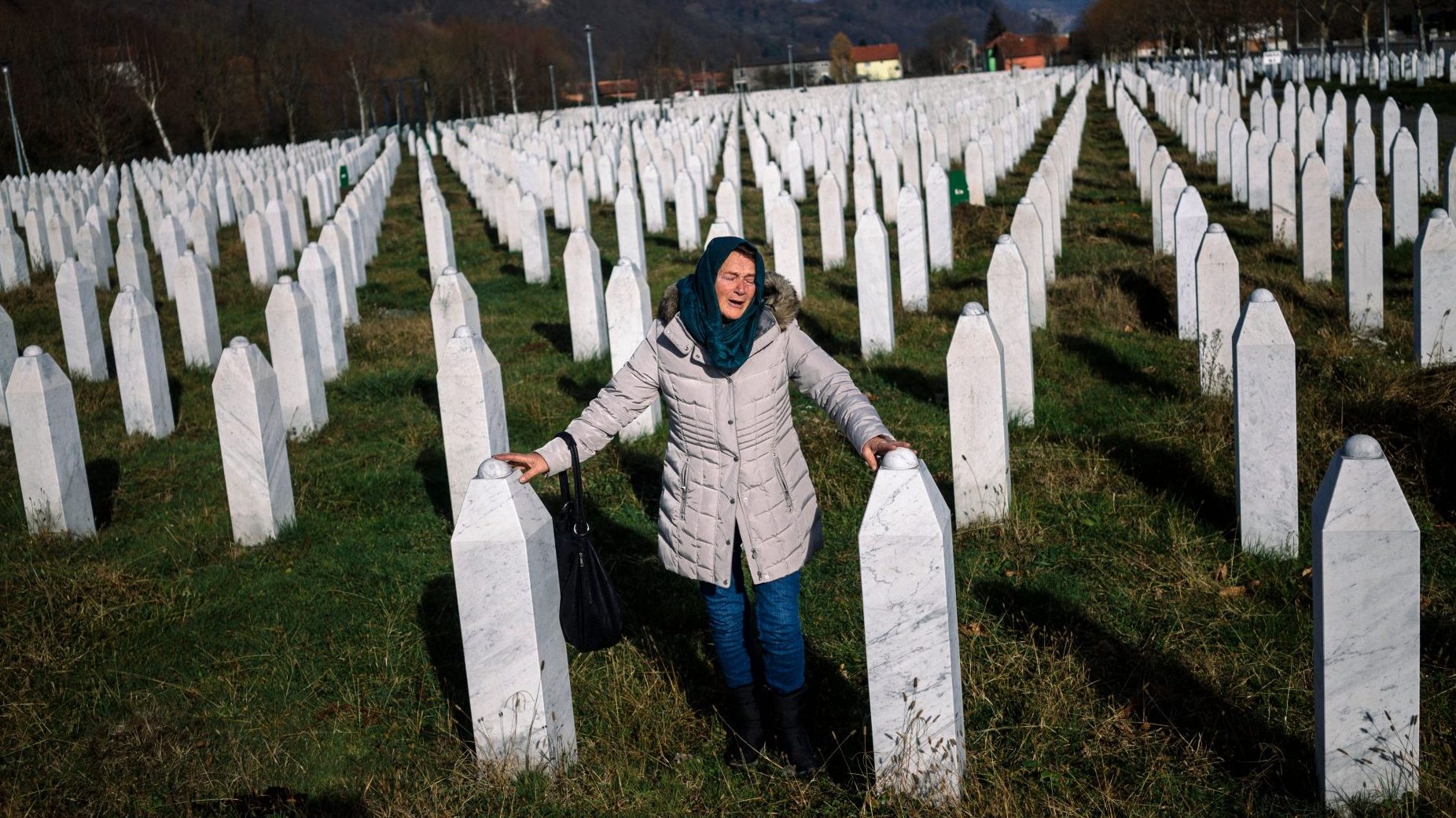 A woman grieves at Potočari memorial near Srebrenica, 2017. Photo: Dimitar Dilkoff/AFP/Getty