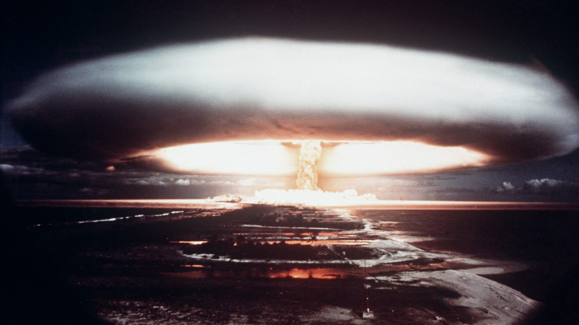 A mushroom cloud follows the explosion of a French atomic bomb above Mururoa in French Polynesia, 1971. Photo: AFP/Getty