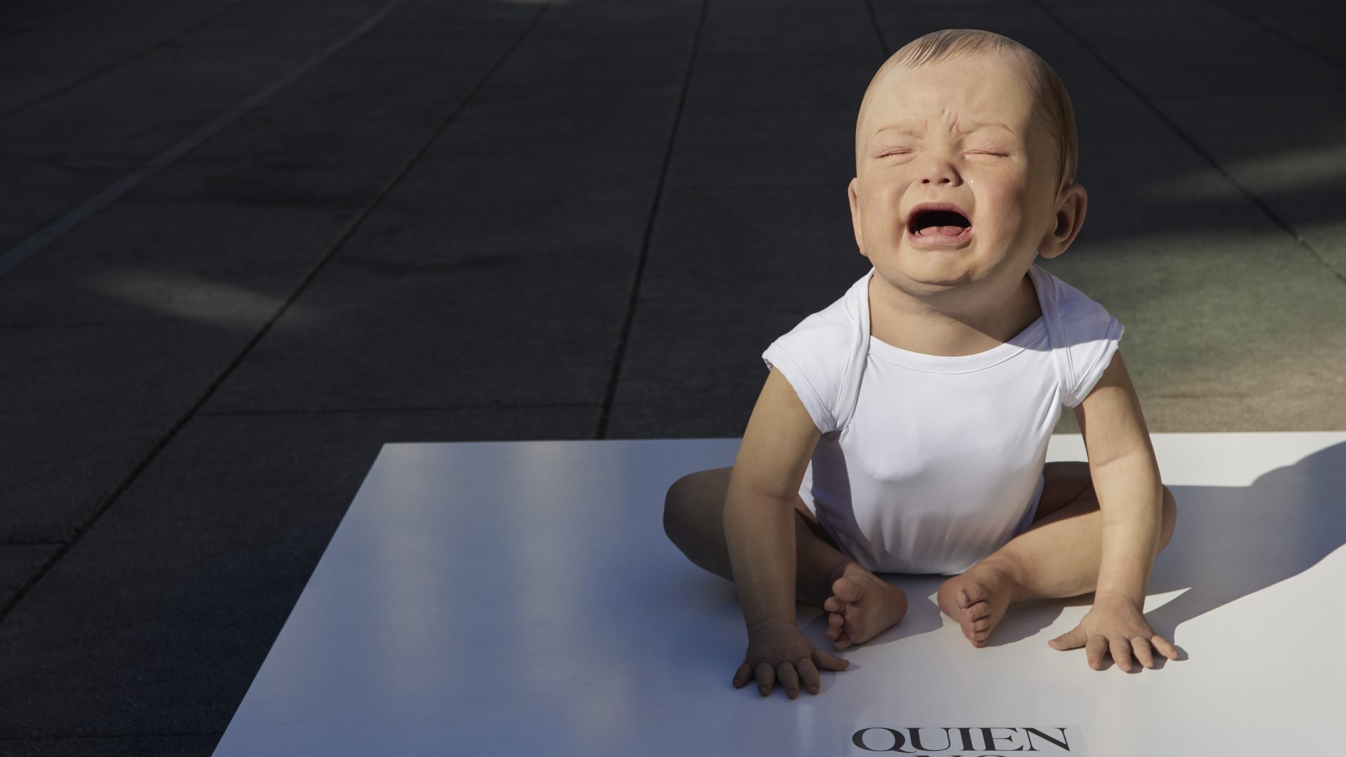 Hyperrealistic sculpture of a crying baby made by the artist Cristina Jobs to demand the regulation of the right to breastfeed in public places, in the square of the Reina Sofia Museum. Photo: Jesus Hellin/Europa Press