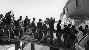 Italian men board a boat in Genoa bound for Buenos Aires, circa 1930. Photo: Keystone/
Hulton Archive