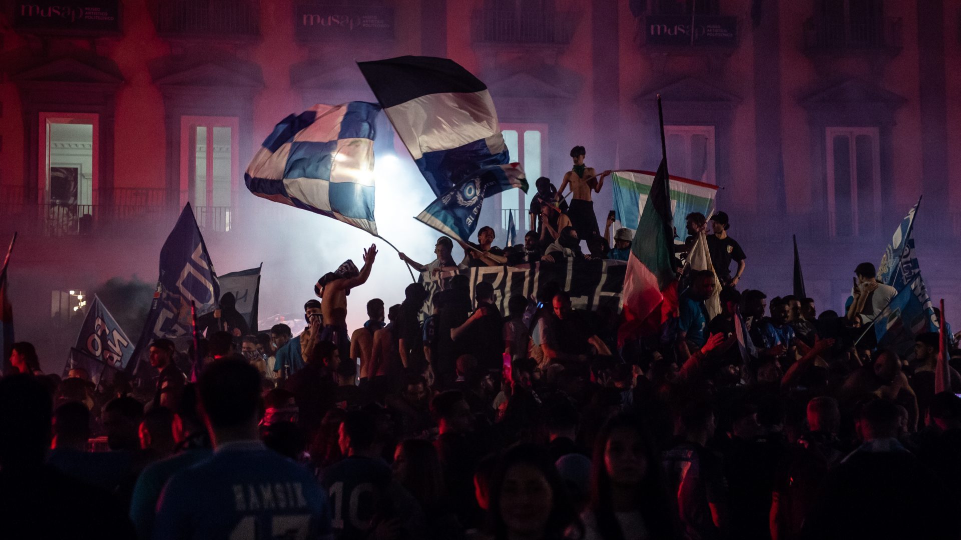 Napoli fans celebrate after winning the Serie A championship on May 04. Photo: Ivan Romano/Getty Images