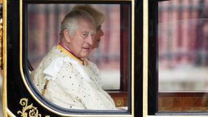 King Charles III and Camilla, Queen Consort travel in the Diamond Jubilee coach ahead of the King’s coronation at Westminster Abbey, May 6. Photo: Christopher Furlong/Getty