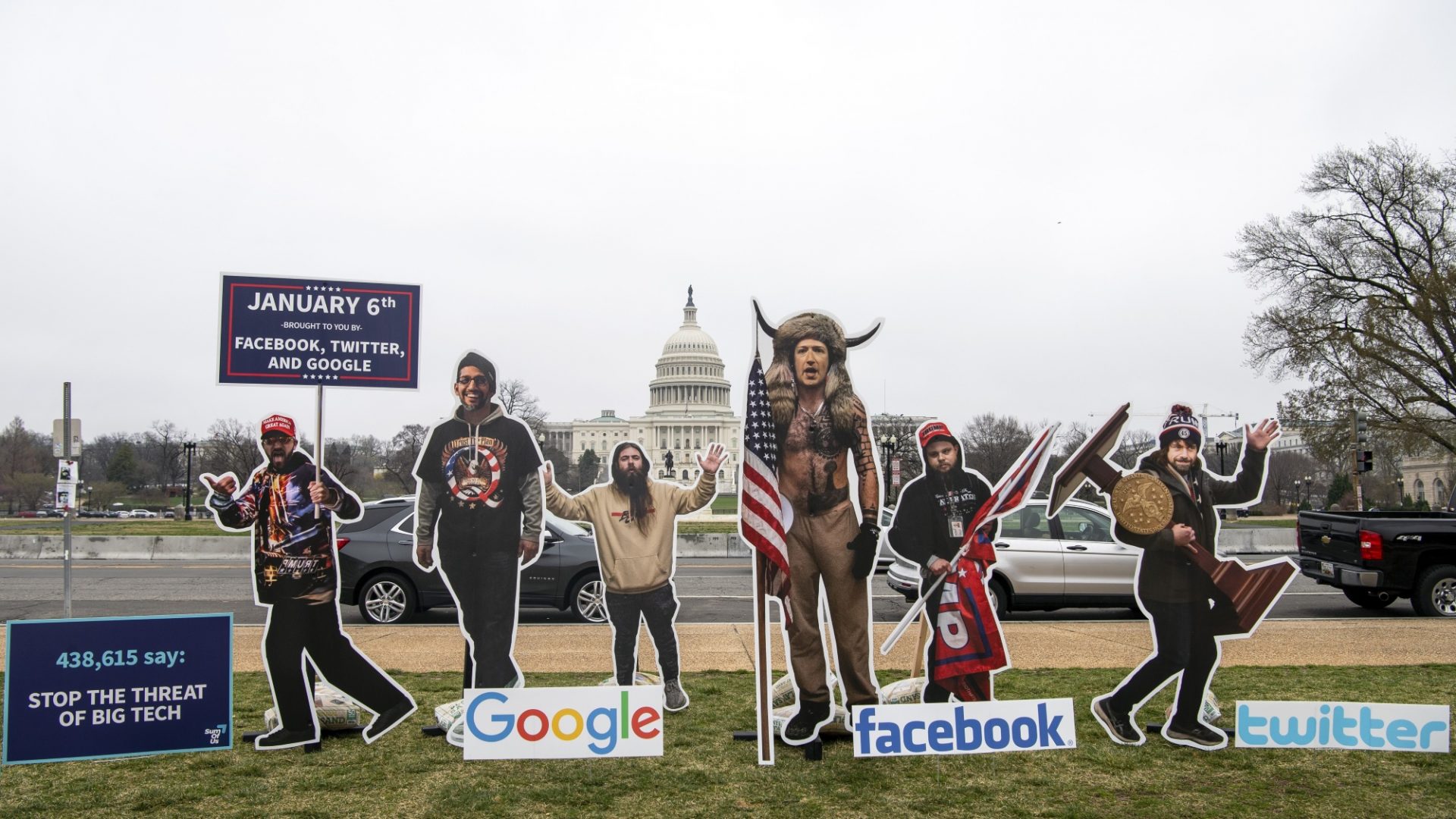 Cutouts of Mark Zuckerberg, CEO of Facebook, and of people involved in the US Capitol insurrection are used to highlight the role of social media in promoting extremism. Photo: Caroline Brehman/CQ-Roll Call/Getty