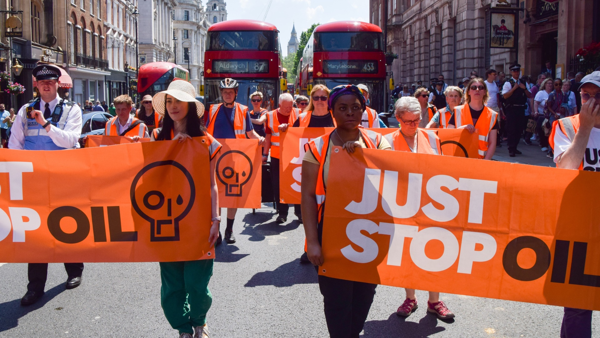 Just Stop Oil protesters hold up public transport as they march through central London. Photo: Vuk Valcic/SOPA Images/LightRocket/Getty 